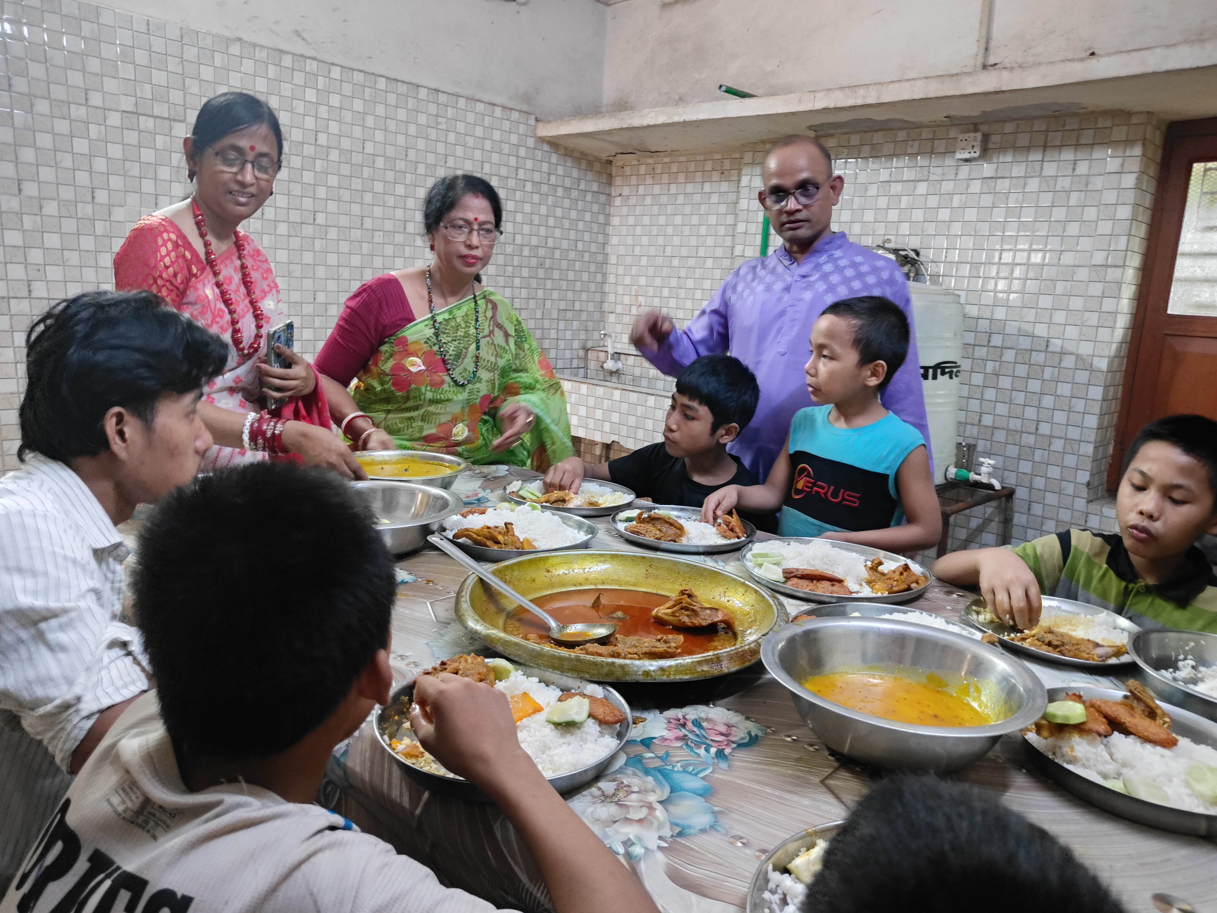 Serving food to orphaned children